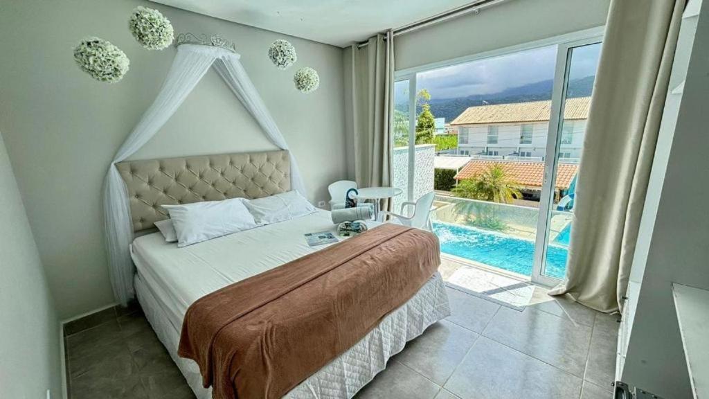 Hotel Encanto Sol & Mar Карагуататуба Экстерьер фото